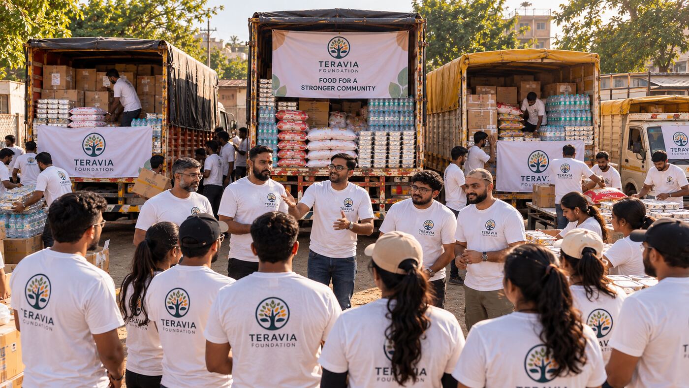 Teravia team briefing in front of supply trucks